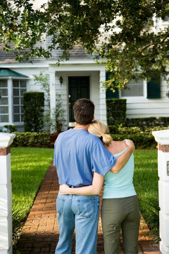 Couple admiring property